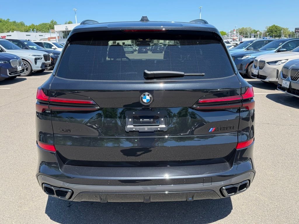 New 2026 Black Sapphire Metallic BMW M60i image 4