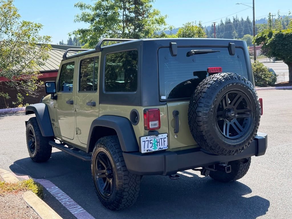 Used 2013 Commando Green Jeep Unlimited Sport image 4