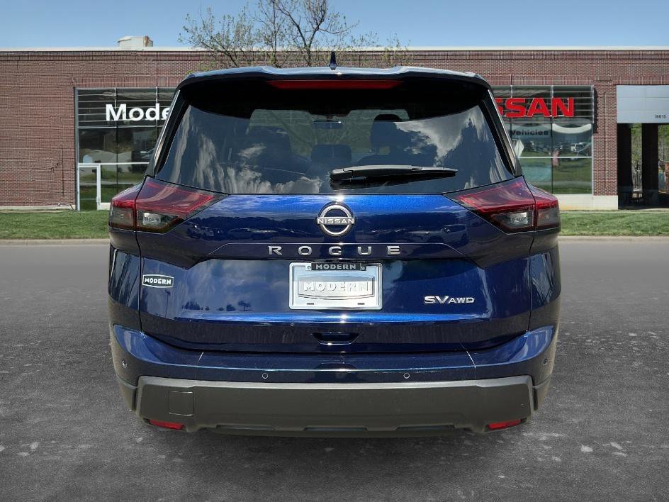Used 2024 Deep Ocean Blue Pearl Nissan SV image 3