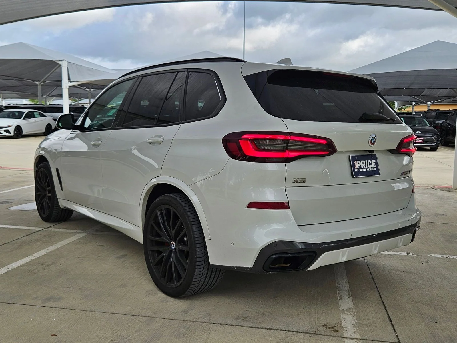 Used 2022 Mineral White Metallic BMW M50i image 7