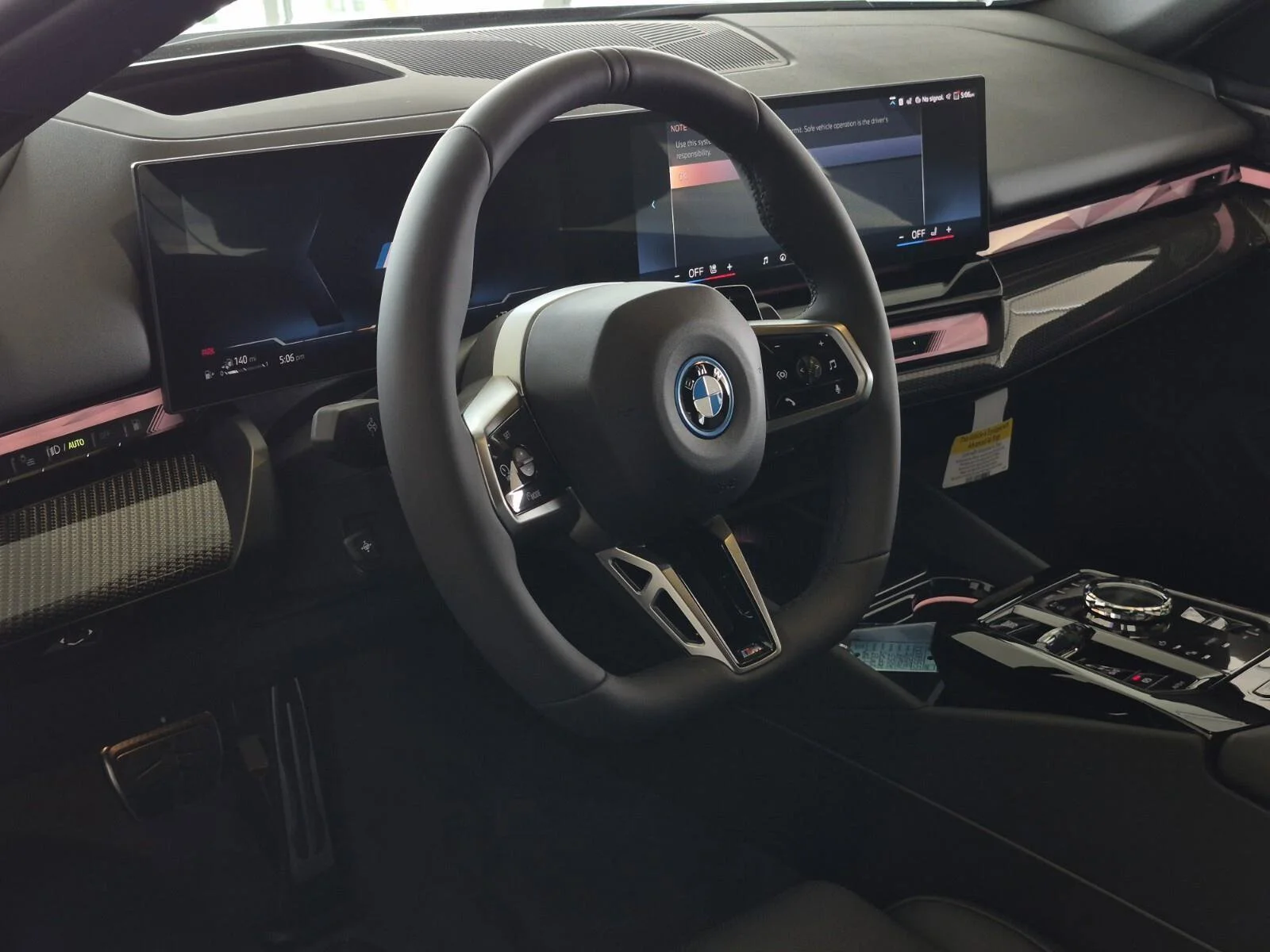 New 2027 Black Sapphire Metallic BMW 550e xDrive image 10