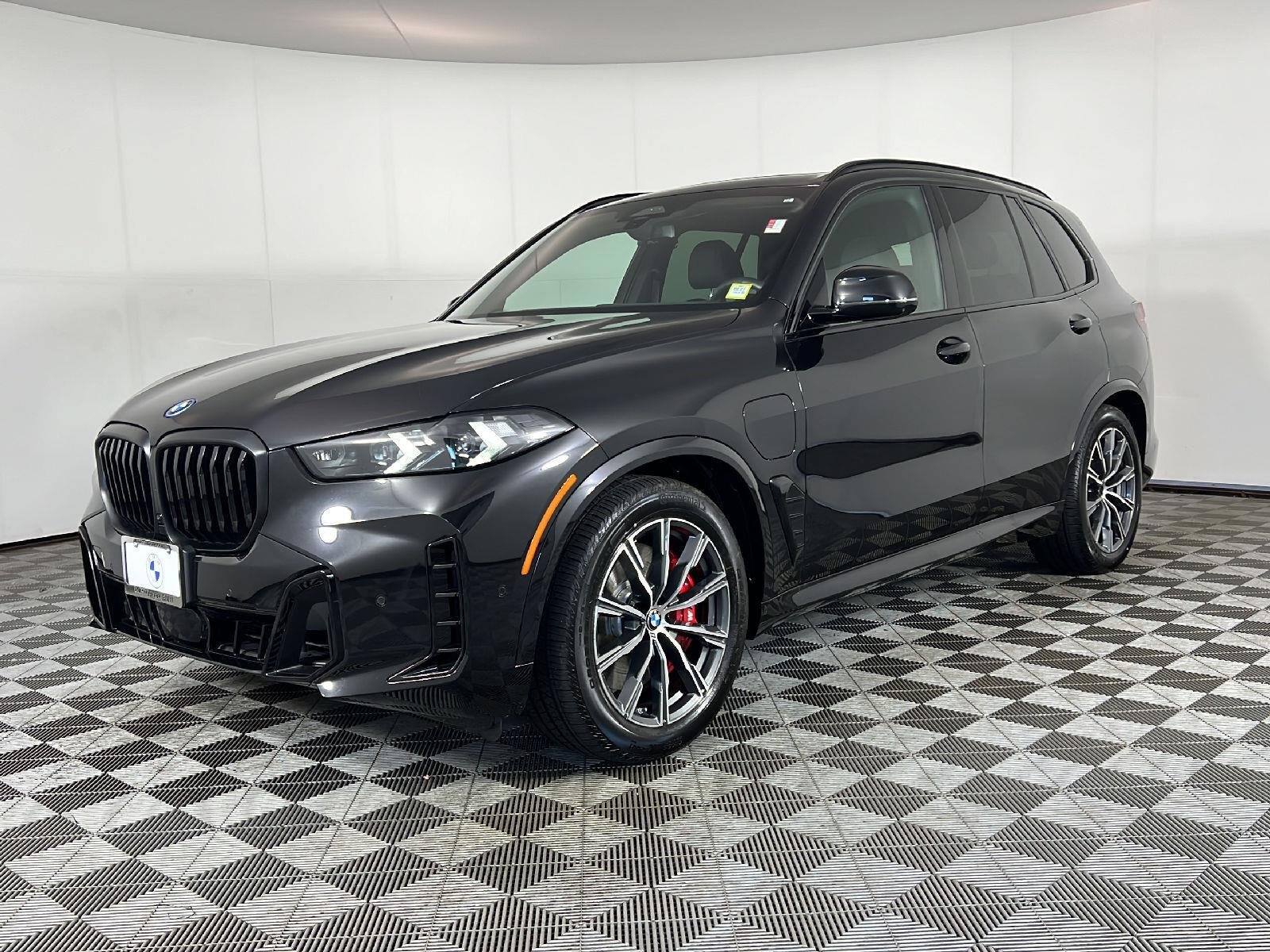 New 2026 Black Sapphire Metallic BMW xDrive50e image 6
