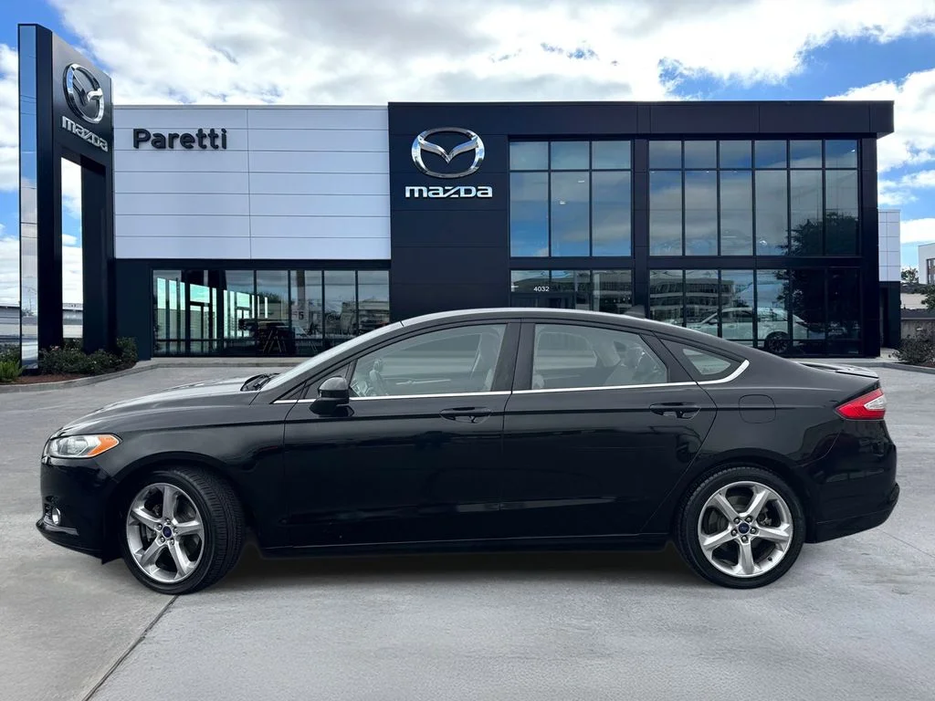 Used 2016 Ford Fusion S with VIN 3FA6P0G74GR337845 for sale in Metairie, LA