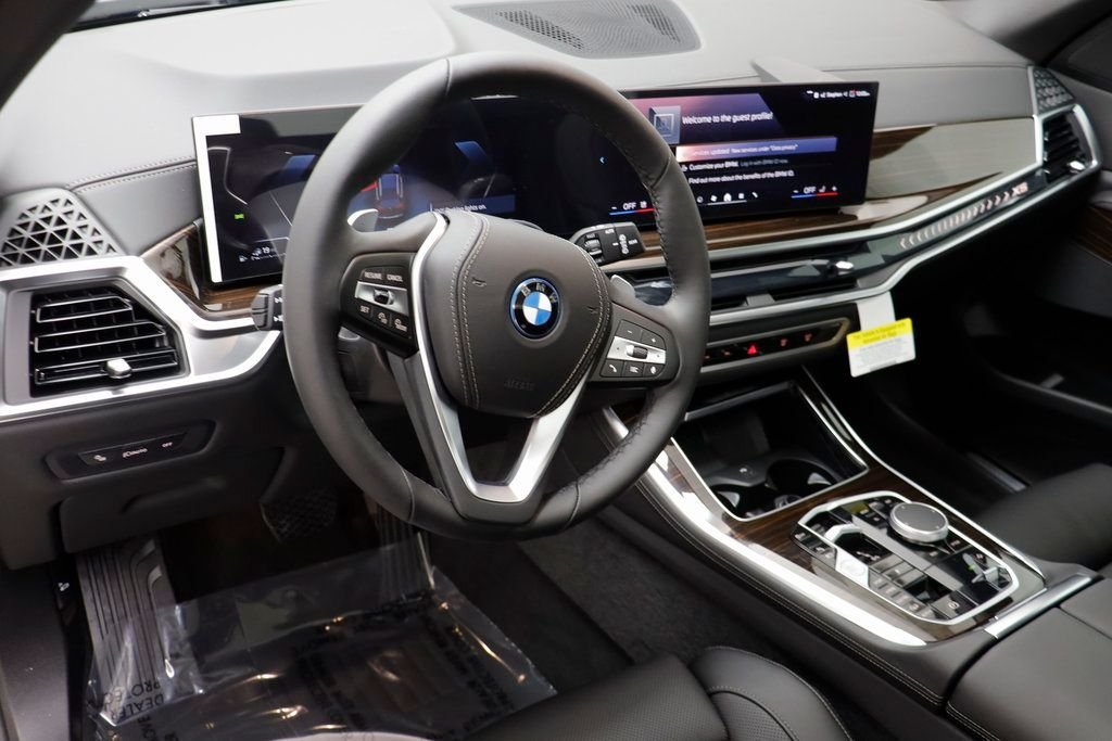 New 2026 Black Sapphire Metallic BMW xDrive50e image 6