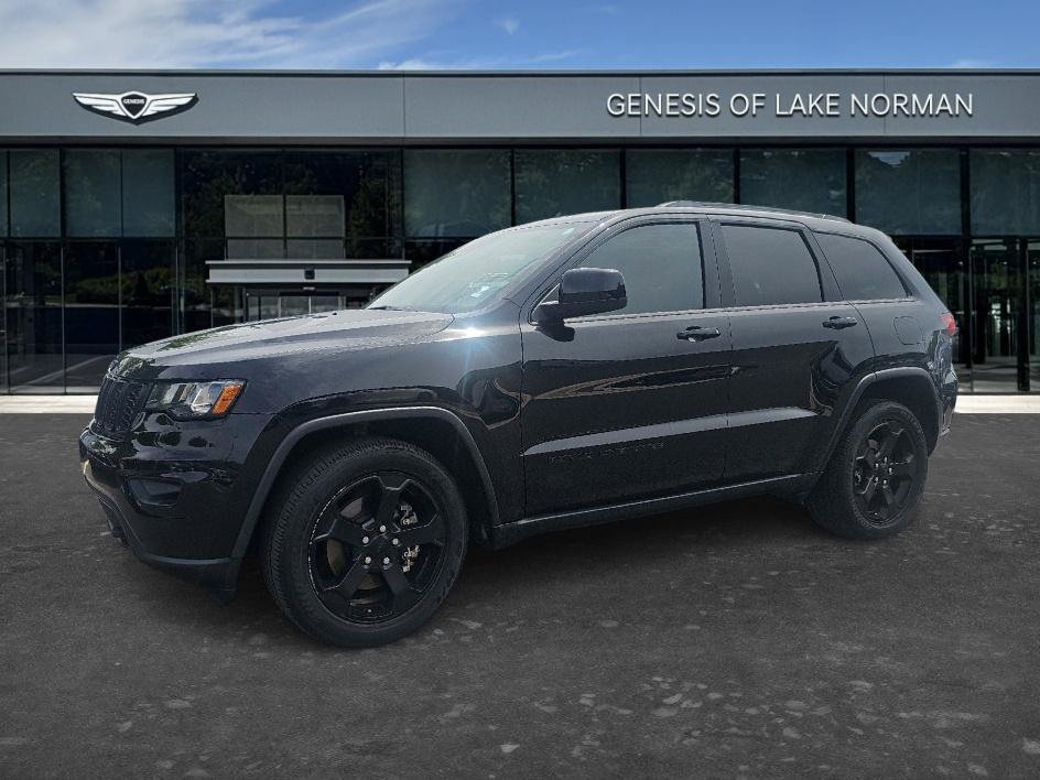 Used 2021 Diamond Black Crystal Pearlcoat Jeep Freedom image 1