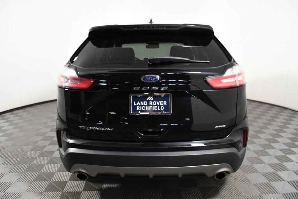 Used 2022 Agate Black Metallic Ford Titanium image 5