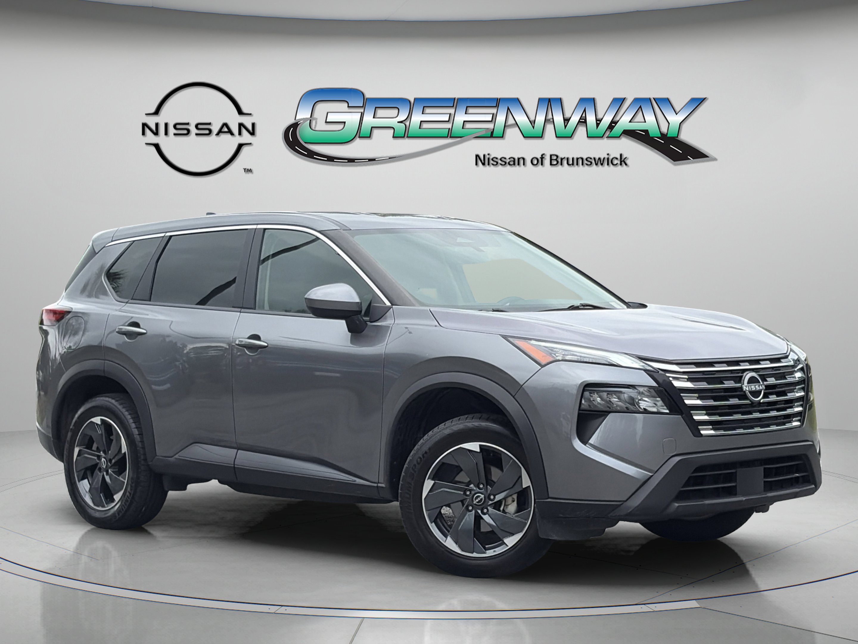 Used 2024 Gun Metallic Nissan SV image 1