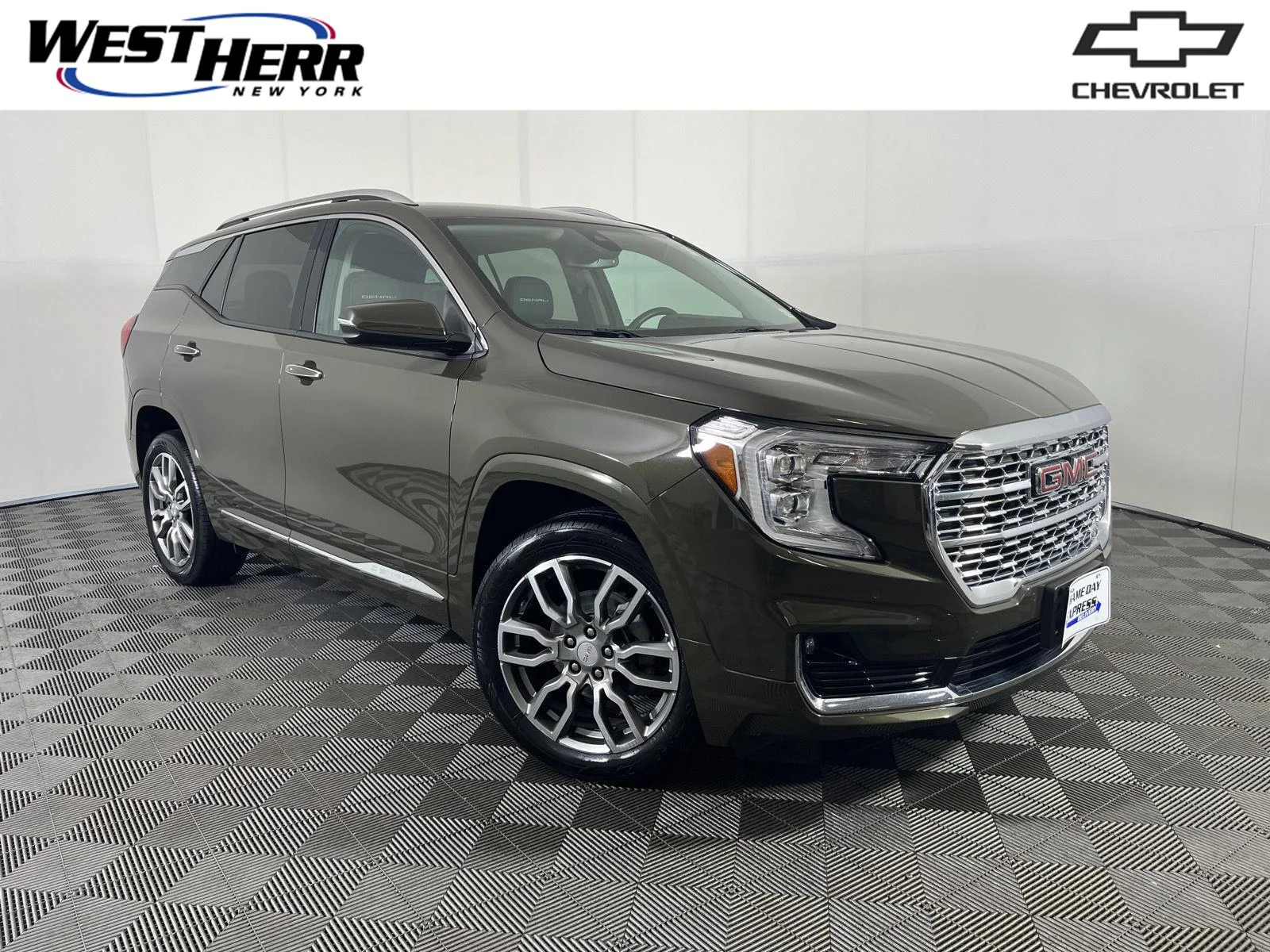 Used 2023 Deep Bronze Metallic GMC Denali image 1