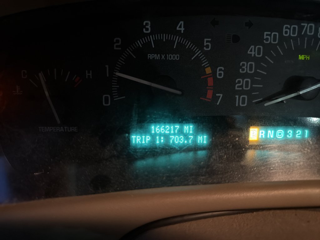 Used 2000 Dark Brown Stripe Buick Base image 1