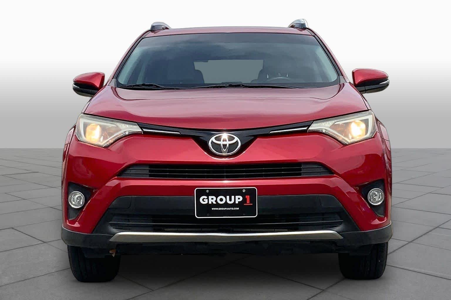 Used 2016 Barcelona Red Metallic Toyota XLE image 4