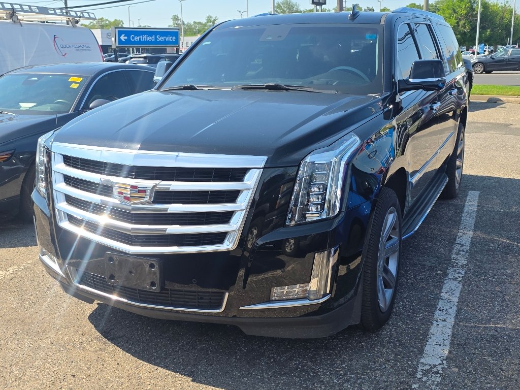 Used 2017 Black Raven Cadillac Luxury image 1