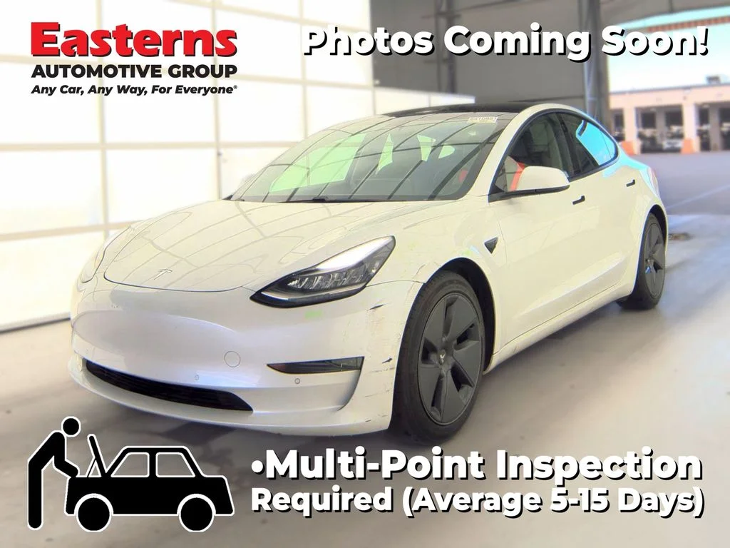 Used 2021 White Tesla Standard Range Plus image 1