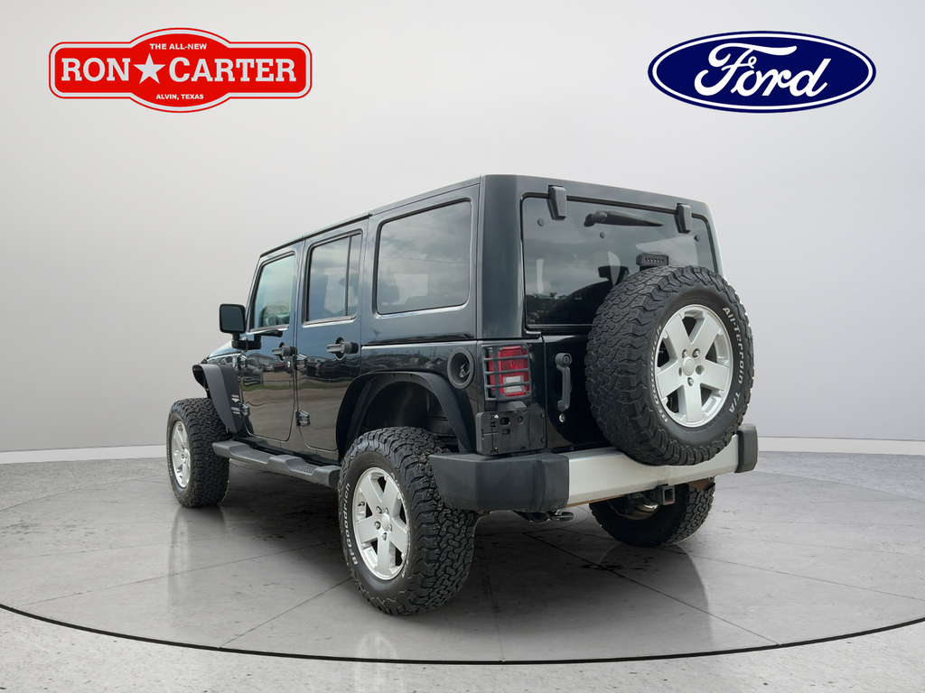 Used 2012 Black Clearcoat Jeep Unlimited Sahara image 4