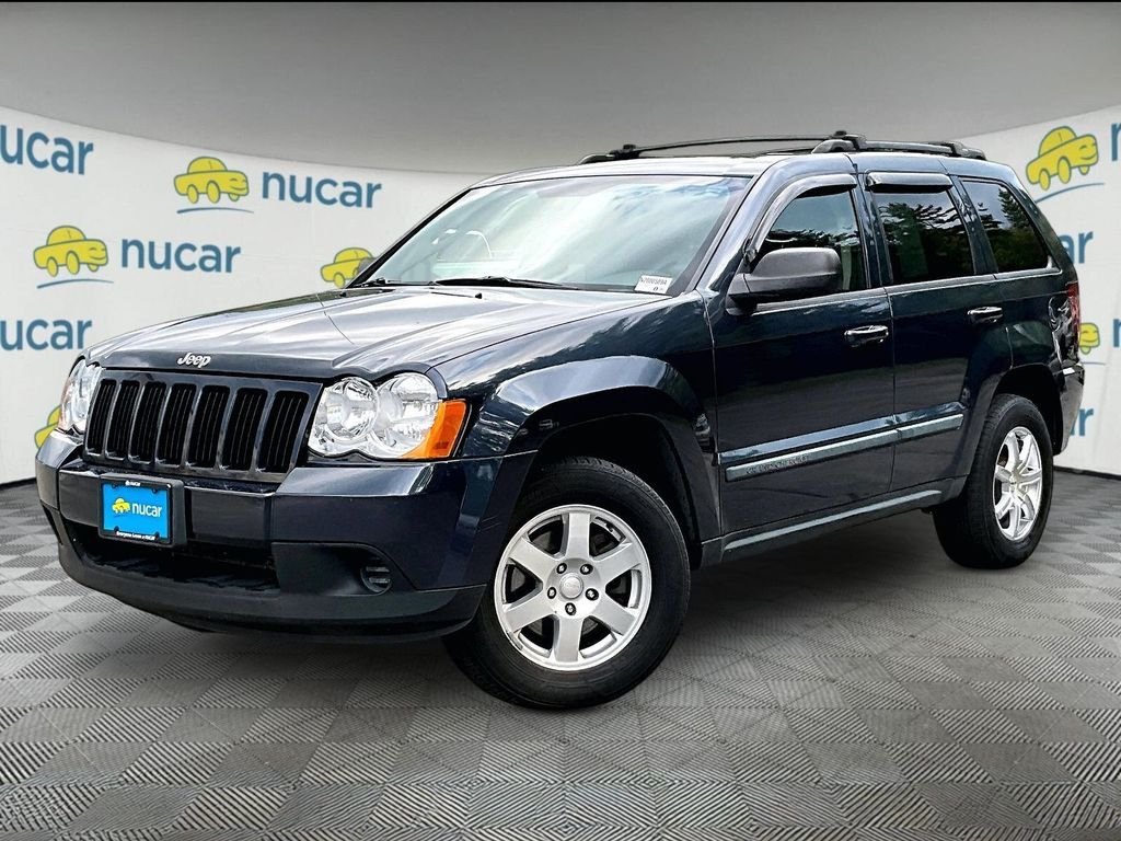 Used 2009 Modern Blue Pearlcoat Jeep Laredo image 3