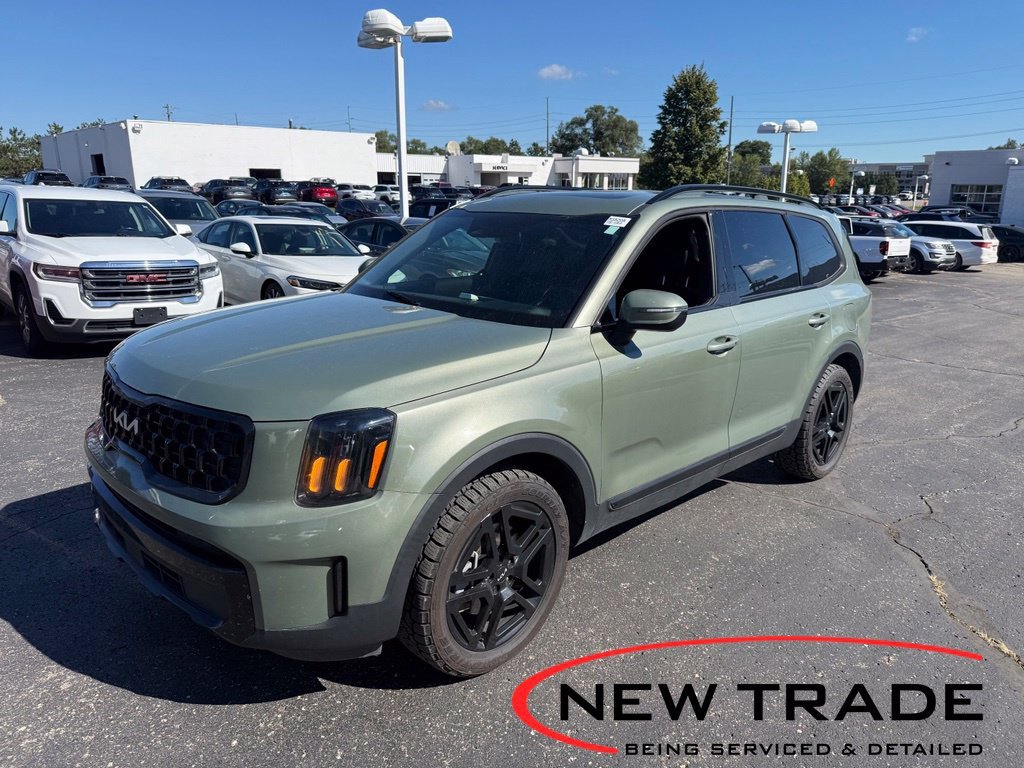 Used 2024 Green Kia EX X-Line image 1