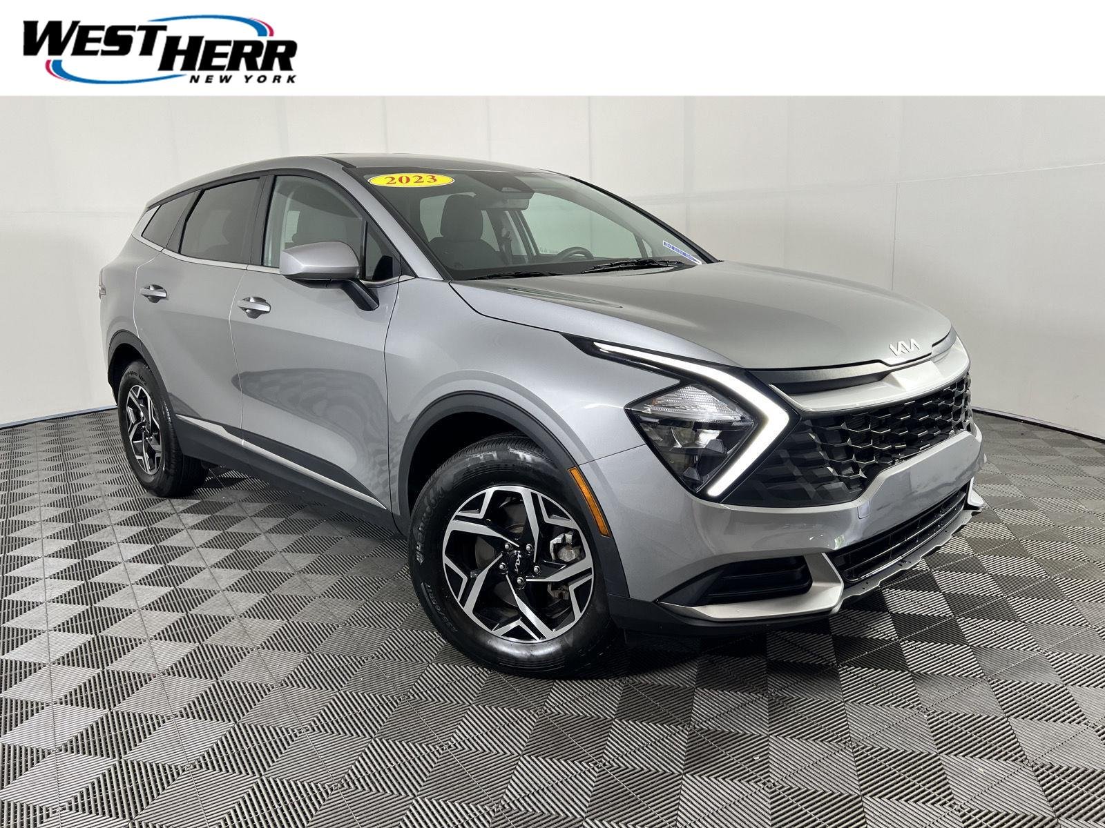Used 2023 Steel Gray Kia LX image 1