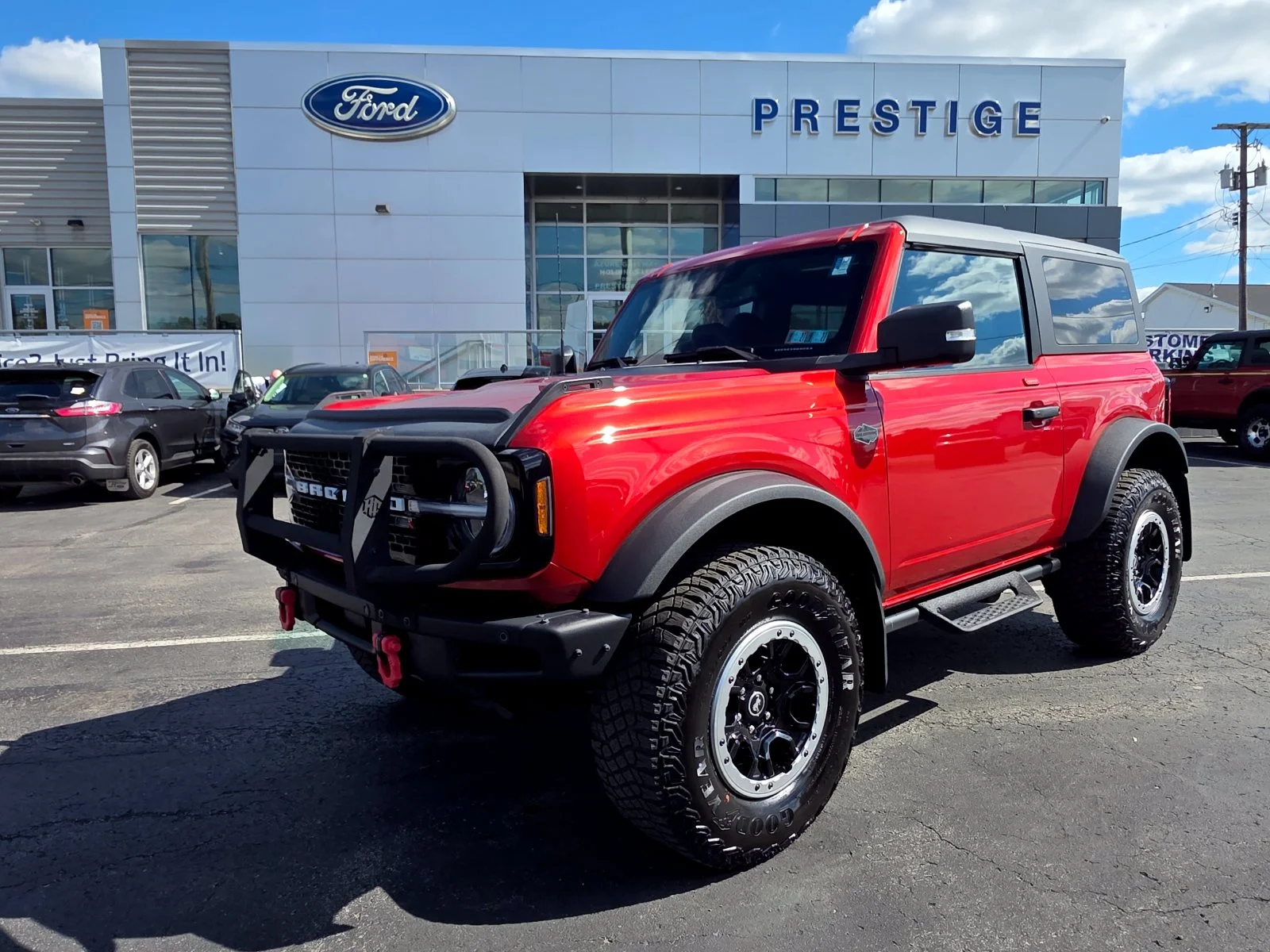 Used 2023 Hot Pepper Red Metallic Tinted Clearcoat Ford Wildtrak image 1