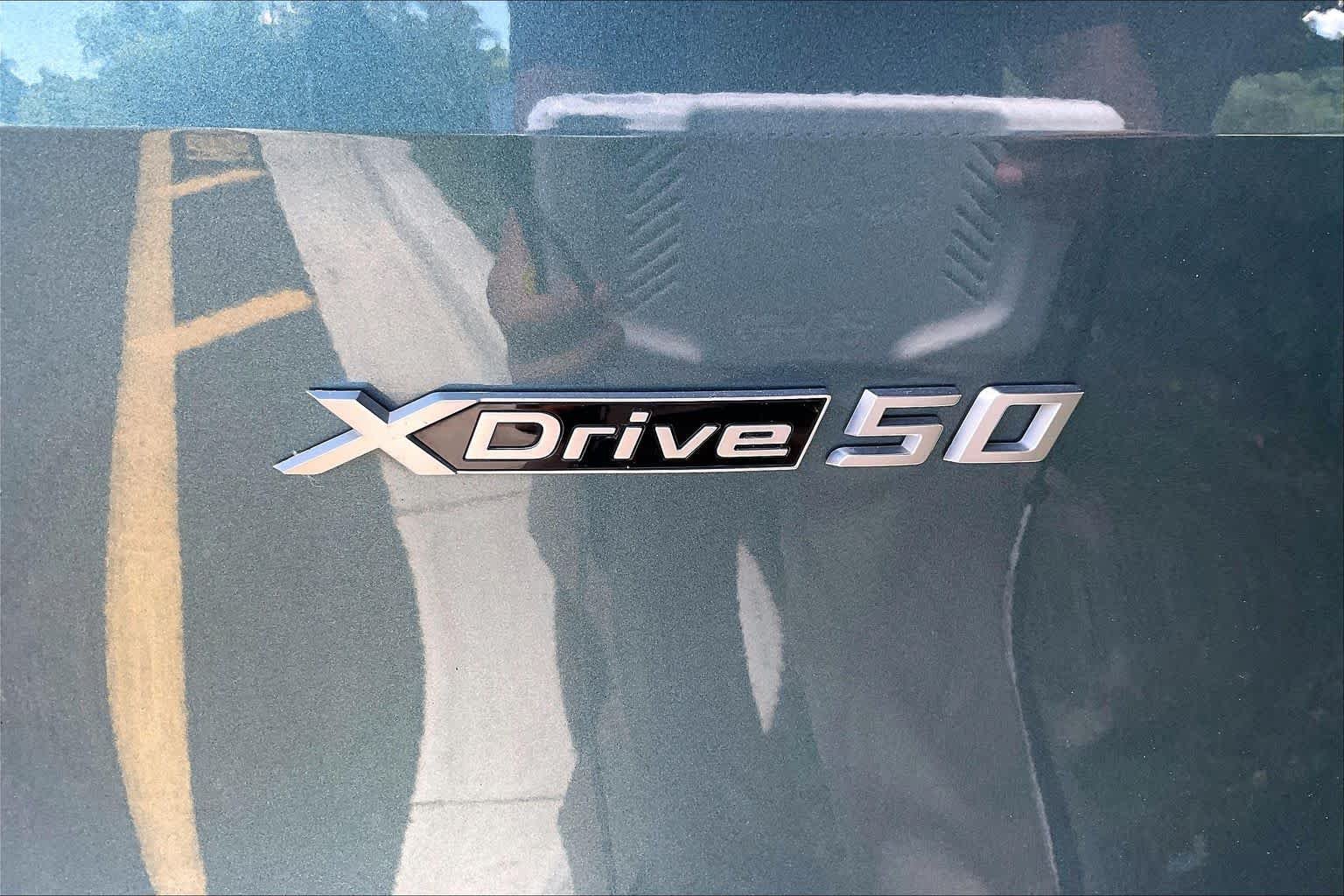 Used 2023 Blue Ridge Mountain Metallic BMW xDrive50 image 9