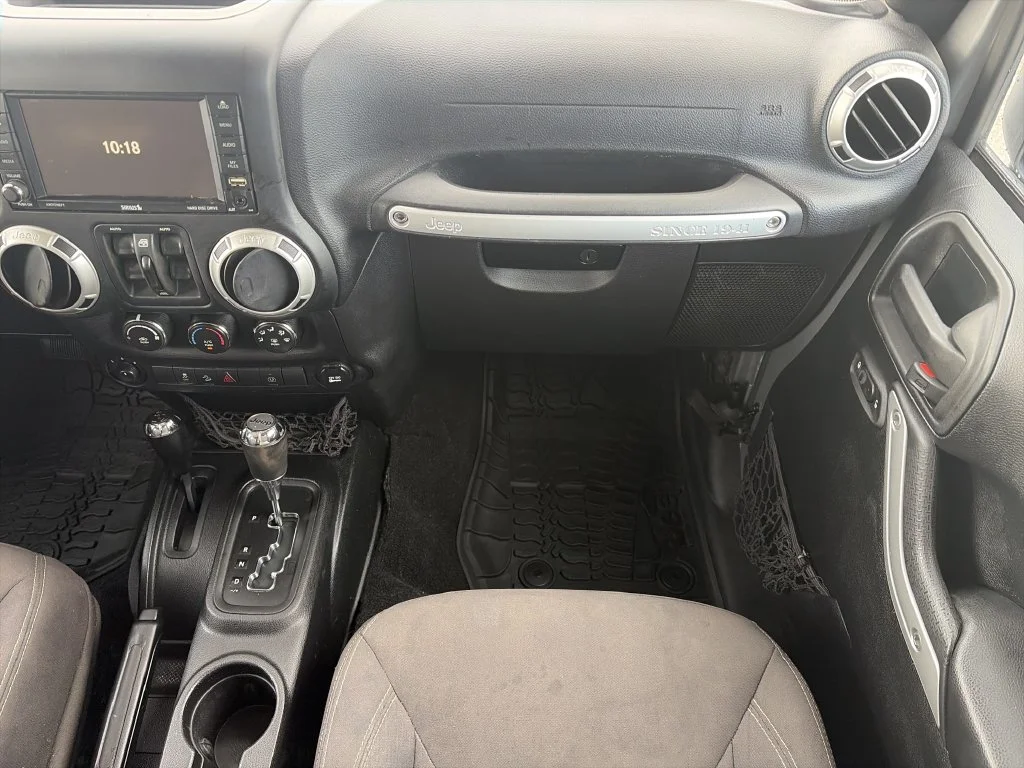 Used 2017 Silver Jeep Unlimited Sahara image 16