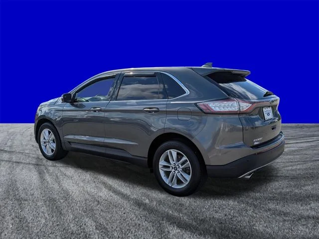Used 2016 Magnetic Metallic Ford SEL image 6