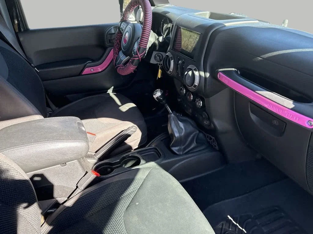 Used 2017 Black Jeep Unlimited Sport image 4