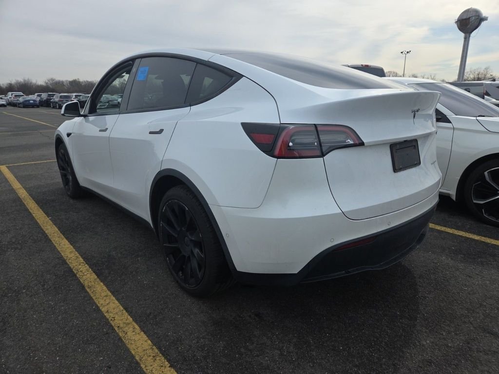 Used 2021 Tesla Model Y Long Range with VIN 5YJYGDEE8MF184525 for sale in Kansas City, KS