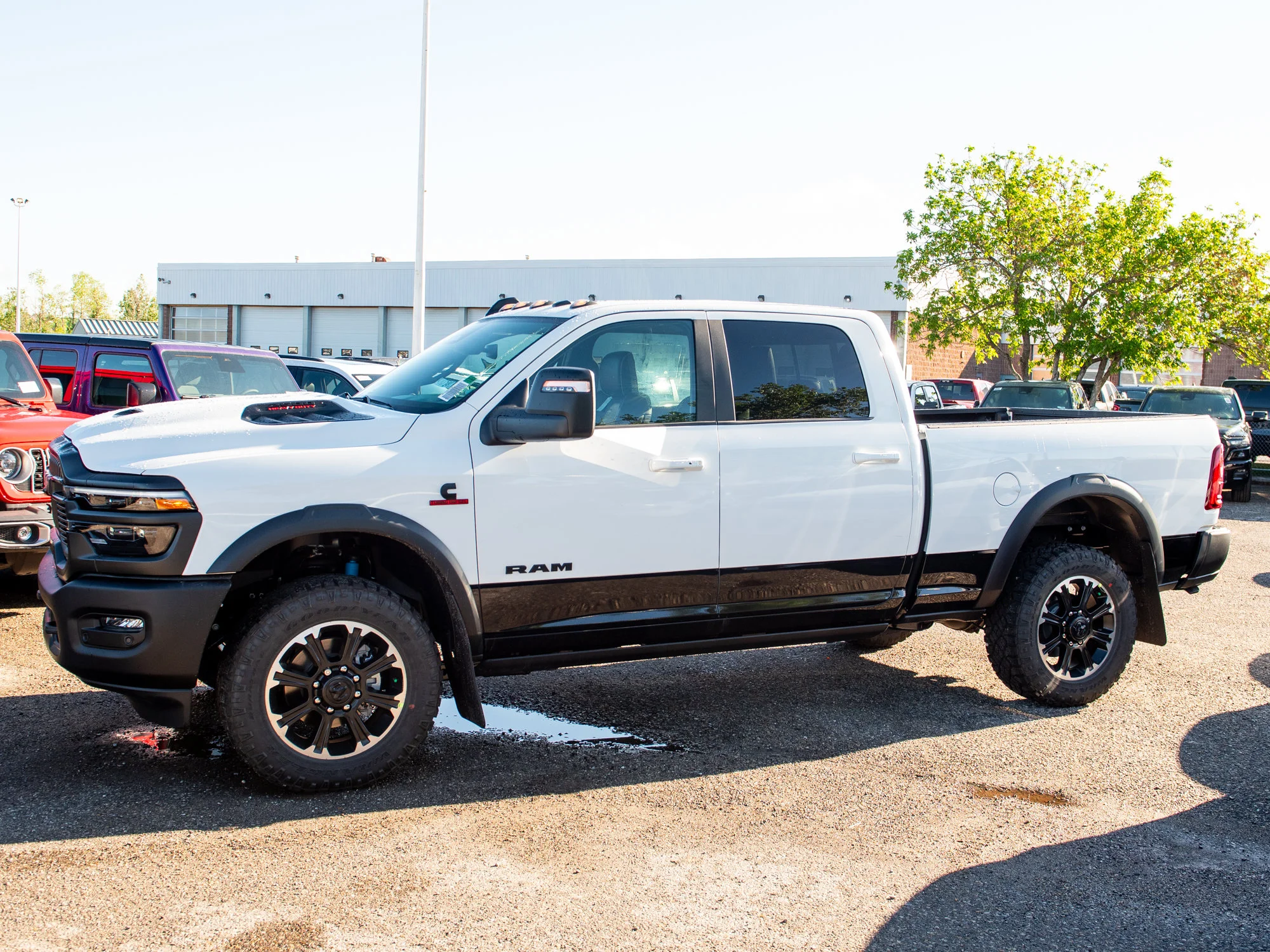 New 2026 White RAM Rebel* Crew Cab 4x4, 6.7L Cummins, Sunroof, 34 Inch A/T Tires image 2