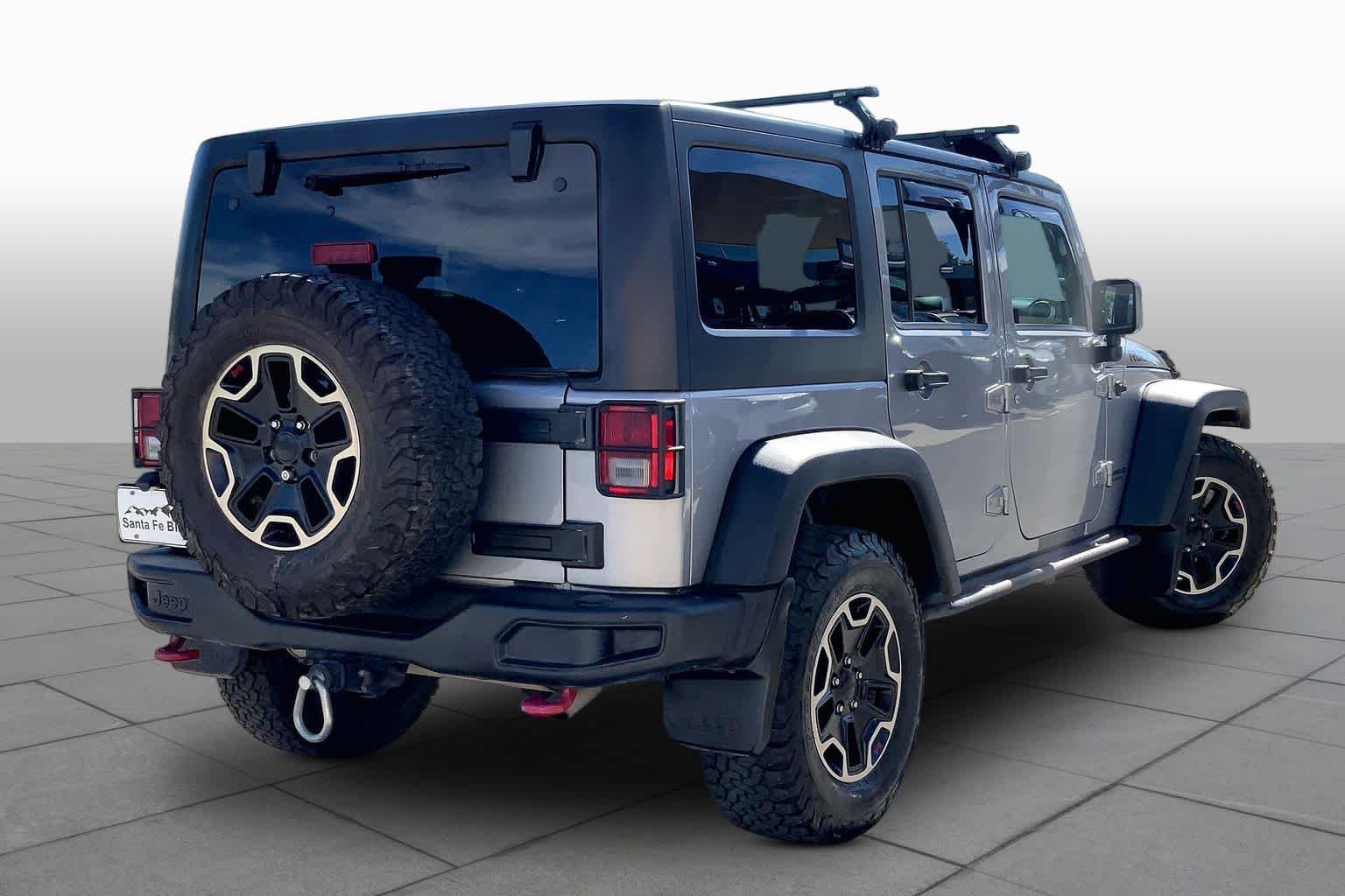Used 2015 Billet Silver Metallic Clearcoat Jeep Rubicon Hard Rock image 12