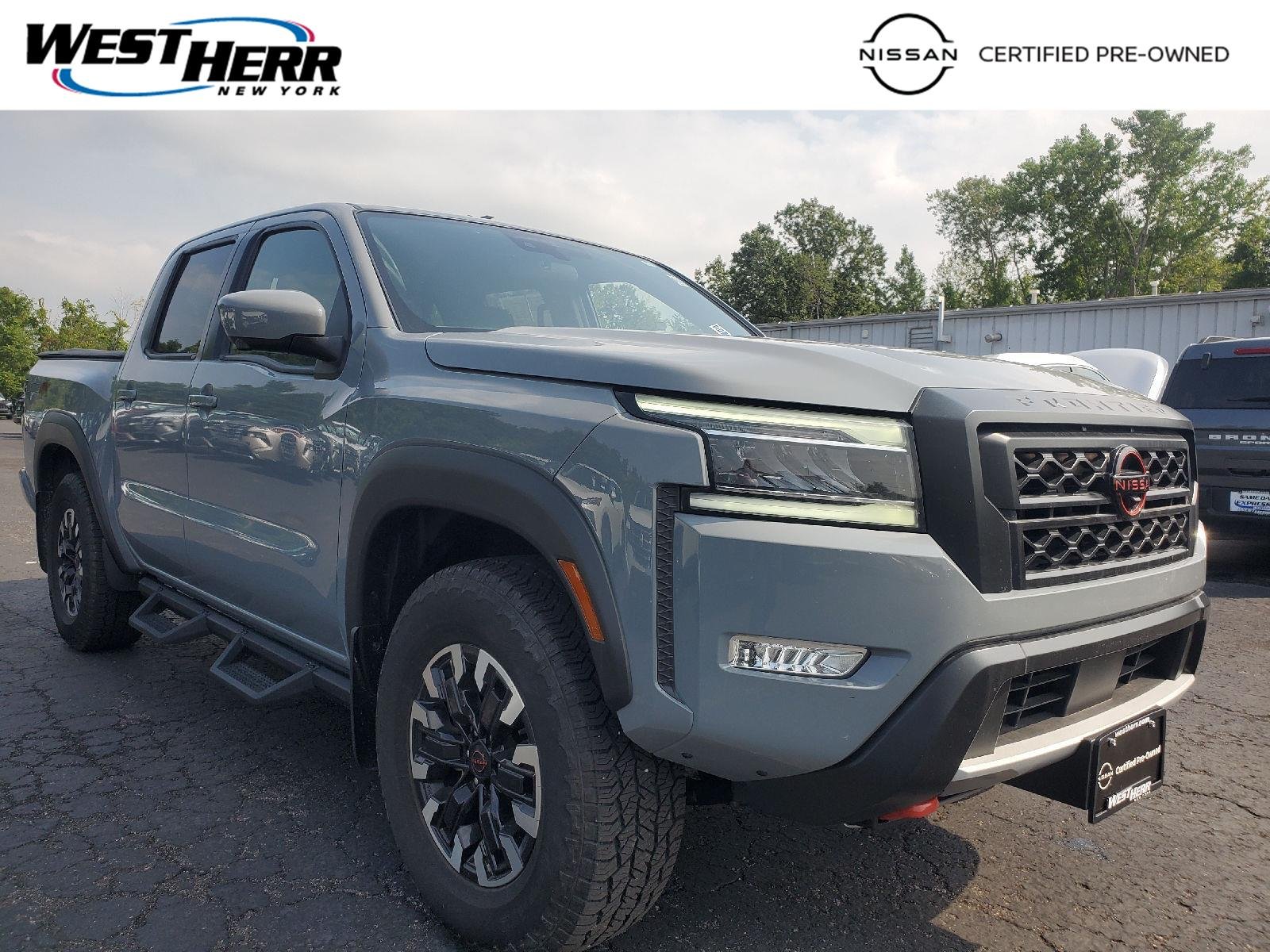 Certified Used 2023 Boulder Gray Pearl Nissan PRO-4X image 1