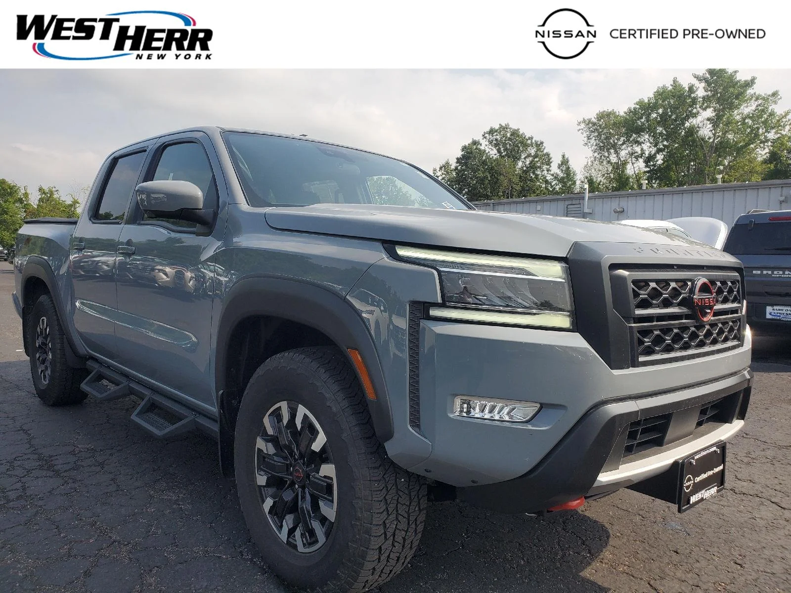 Certified Used 2023 Boulder Gray Pearl Nissan PRO-4X image 1