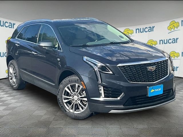 Used 2021 Green Cadillac Premium Luxury image 1