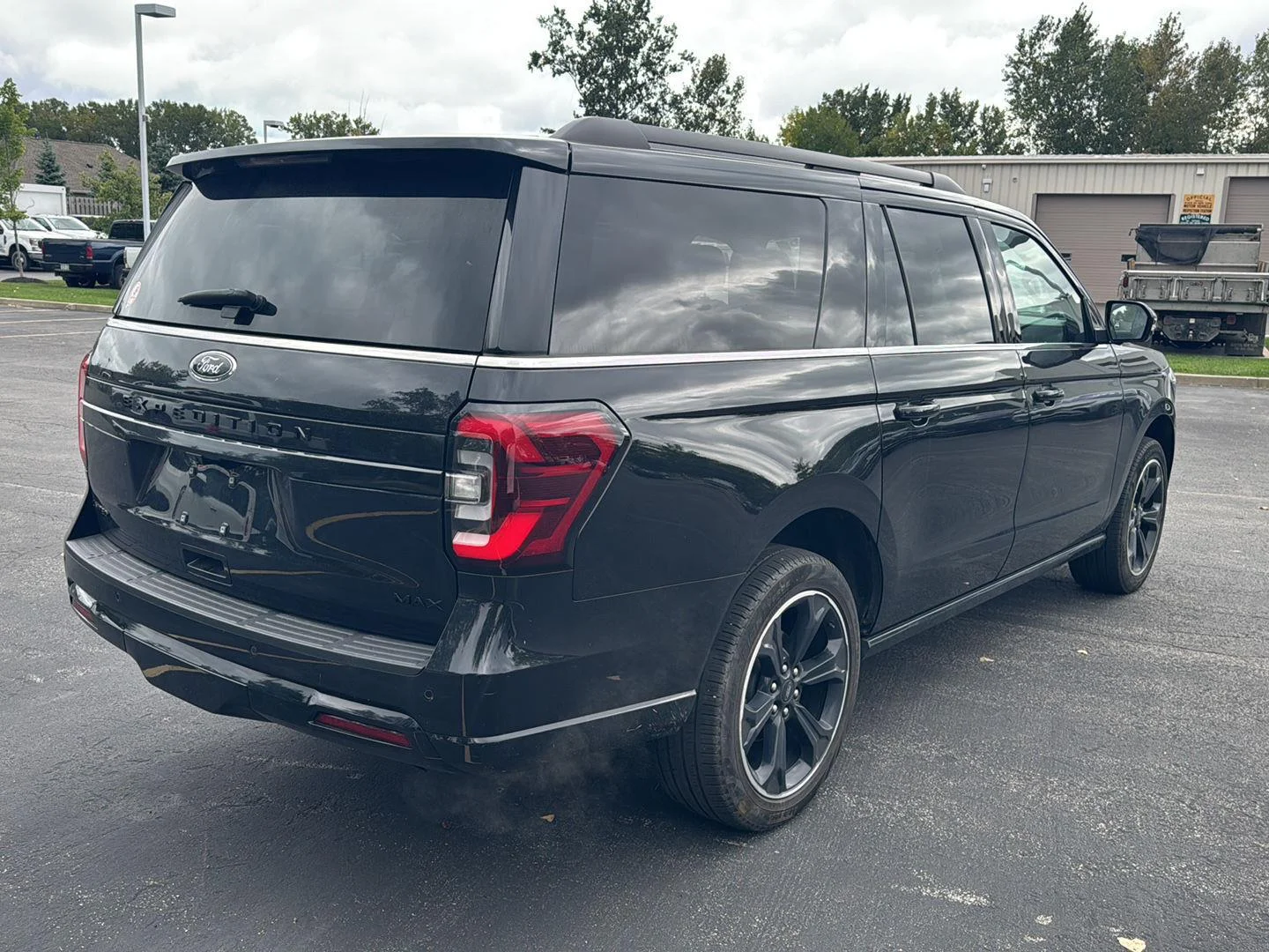 Used 2024 Agate Black Metallic Ford Limited image 4
