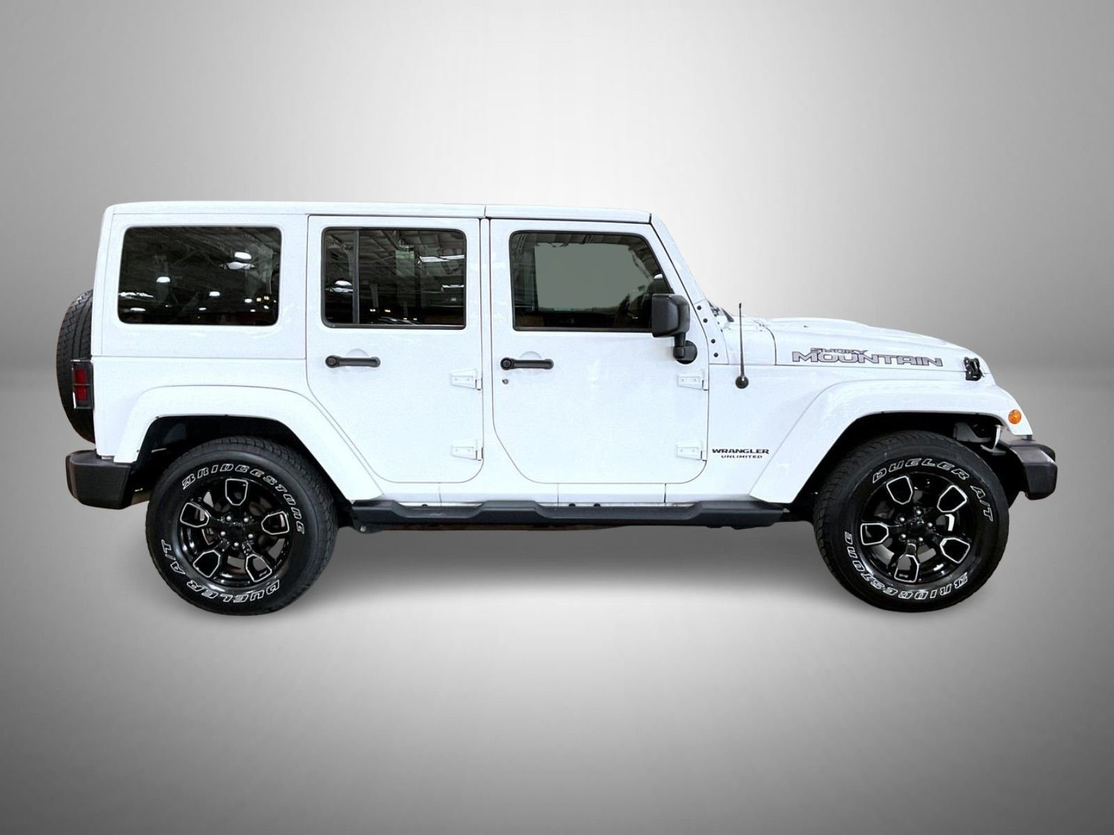 Used 2017 White Jeep Unlimited Sahara image 4