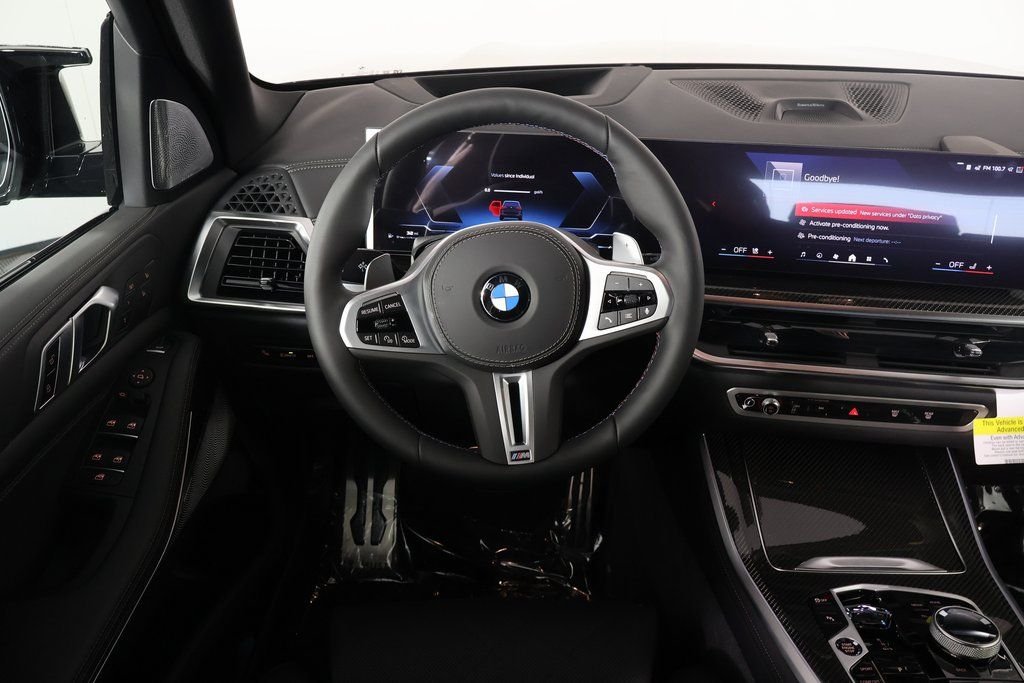 New 2026 Black Sapphire Metallic BMW M60i image 3