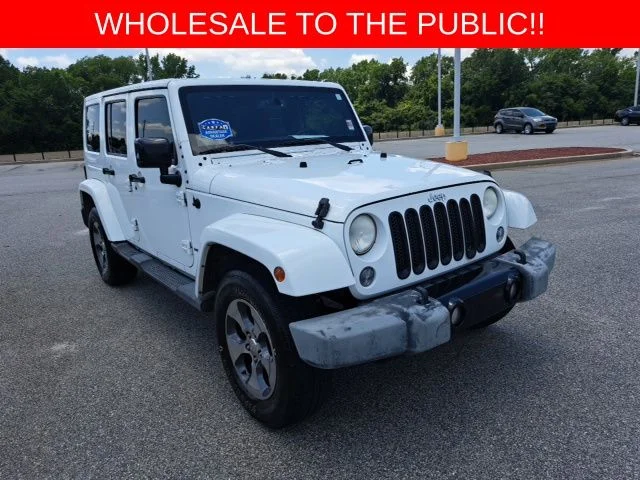 Used 2014 White Jeep Unlimited Sahara image 1