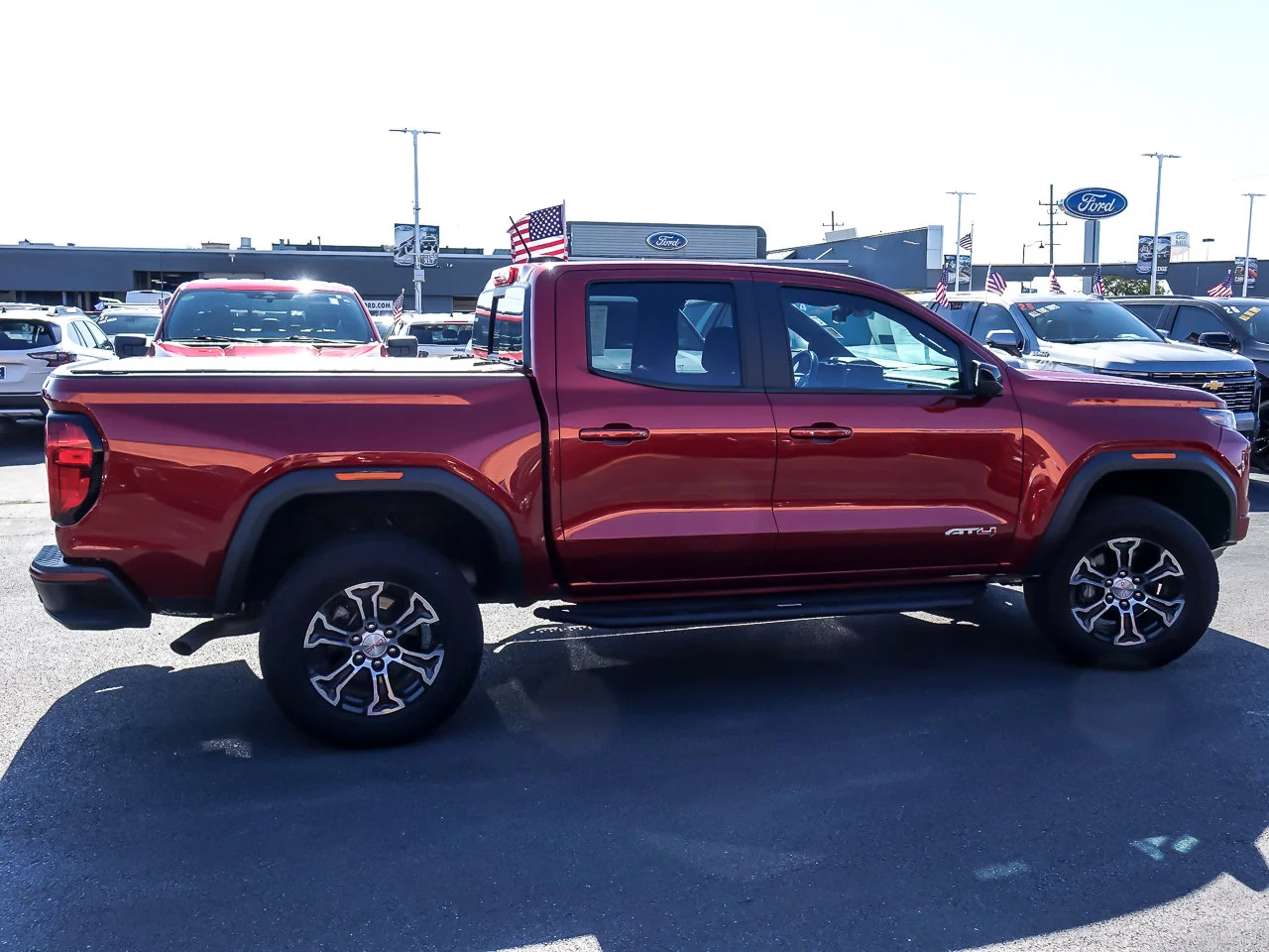 Used 2024 Volcanic Red Tintcoat GMC 4WD AT4 image 8
