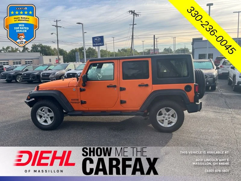 Used 2013 Orange Jeep Unlimited Sport image 4