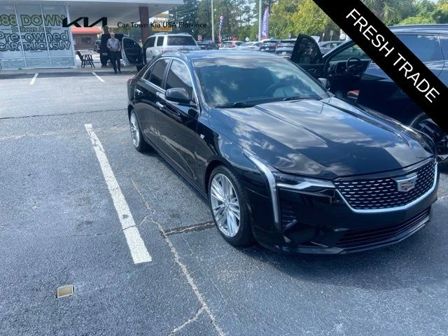 Used 2021 Black Cadillac Premium Luxury image 1