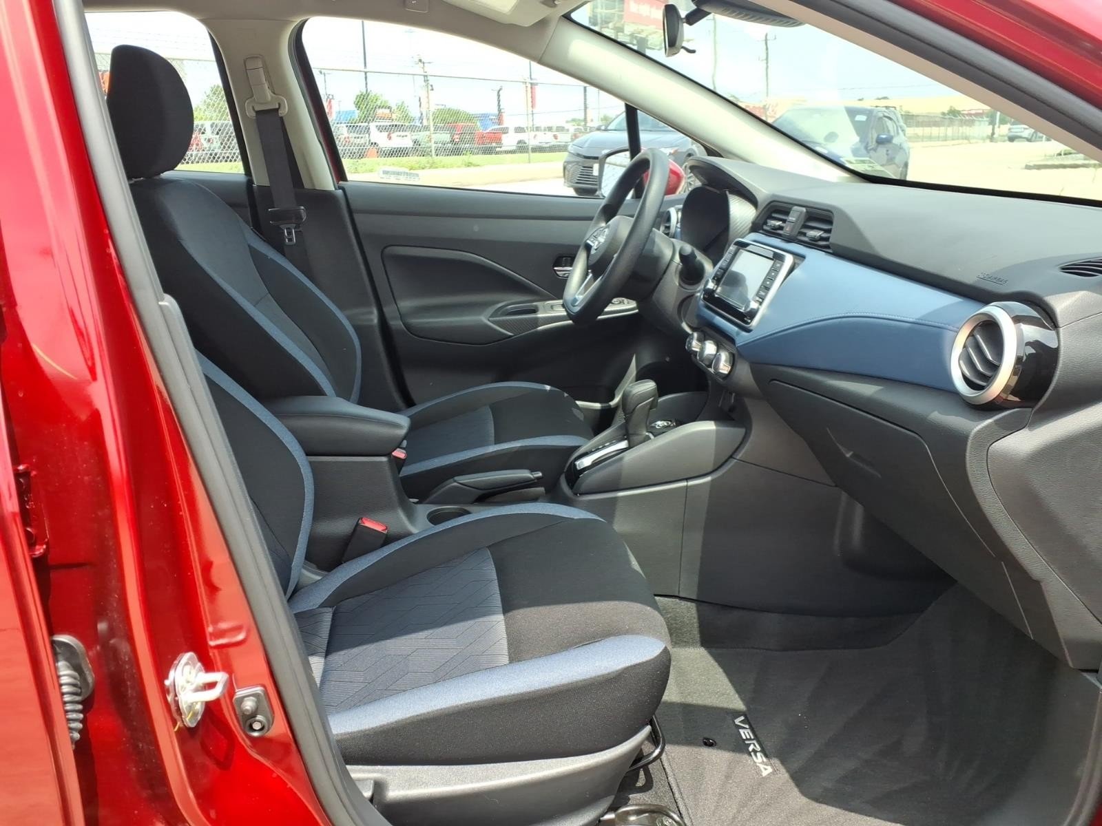 2025 Nissan Versa SV Red at Robbins Nissan