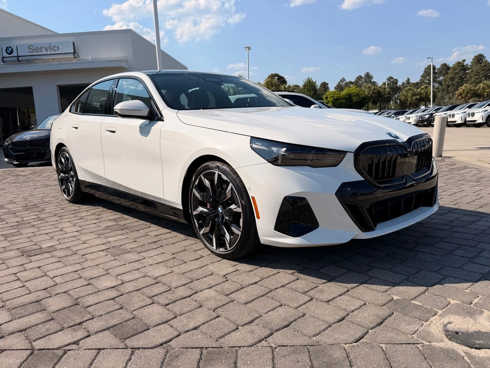 2026 BMW 5 Series 550e - Photo 7