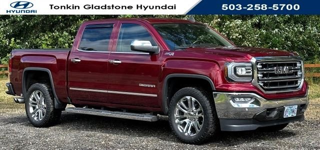 Used 2017 Crimson Red Tintcoat GMC SLT image 1