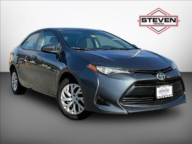 Used 2017 Gray Toyota LE image 1