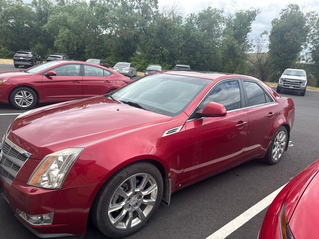 Used 2009 Crystal Red Tint Cadillac Base image 1