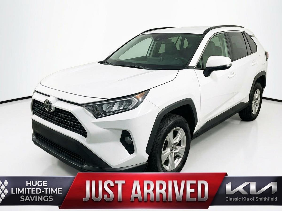 Used 2020 Super White Toyota XLE image 1