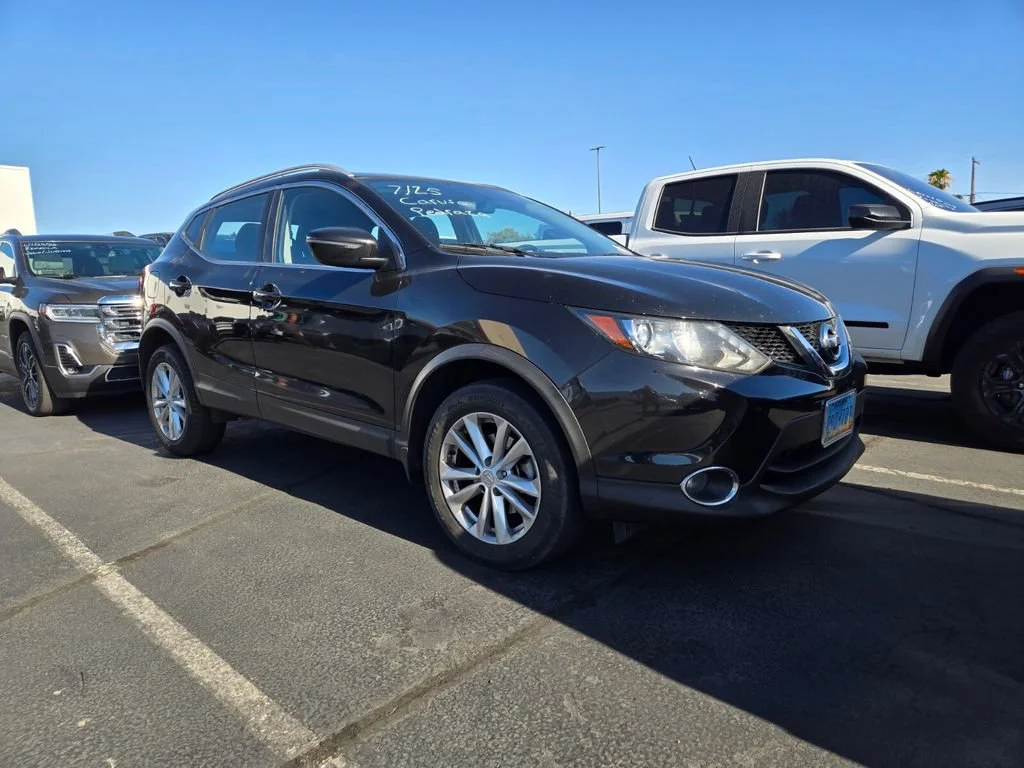 Used 2018 Magnetic Black Nissan SV image 1