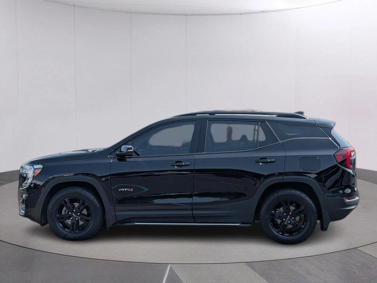 Used 2023 EBONY TWILIGHT METALLIC GMC AT4 image 2
