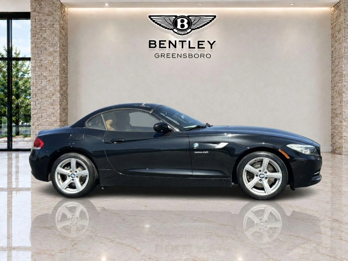 Used 2011 Black Sapphire Metallic BMW sDrive30i image 6