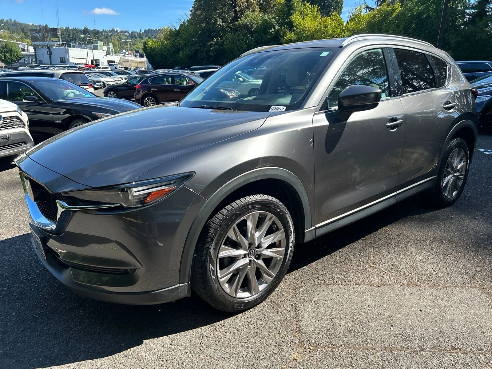 Used 2019 Machine Gray Metallic Mazda Grand Touring image 1