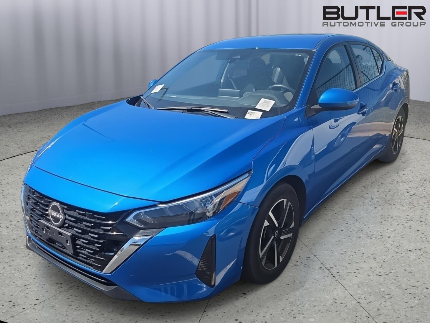 Used 2025 Electric Blue Metallic Nissan SV image 1