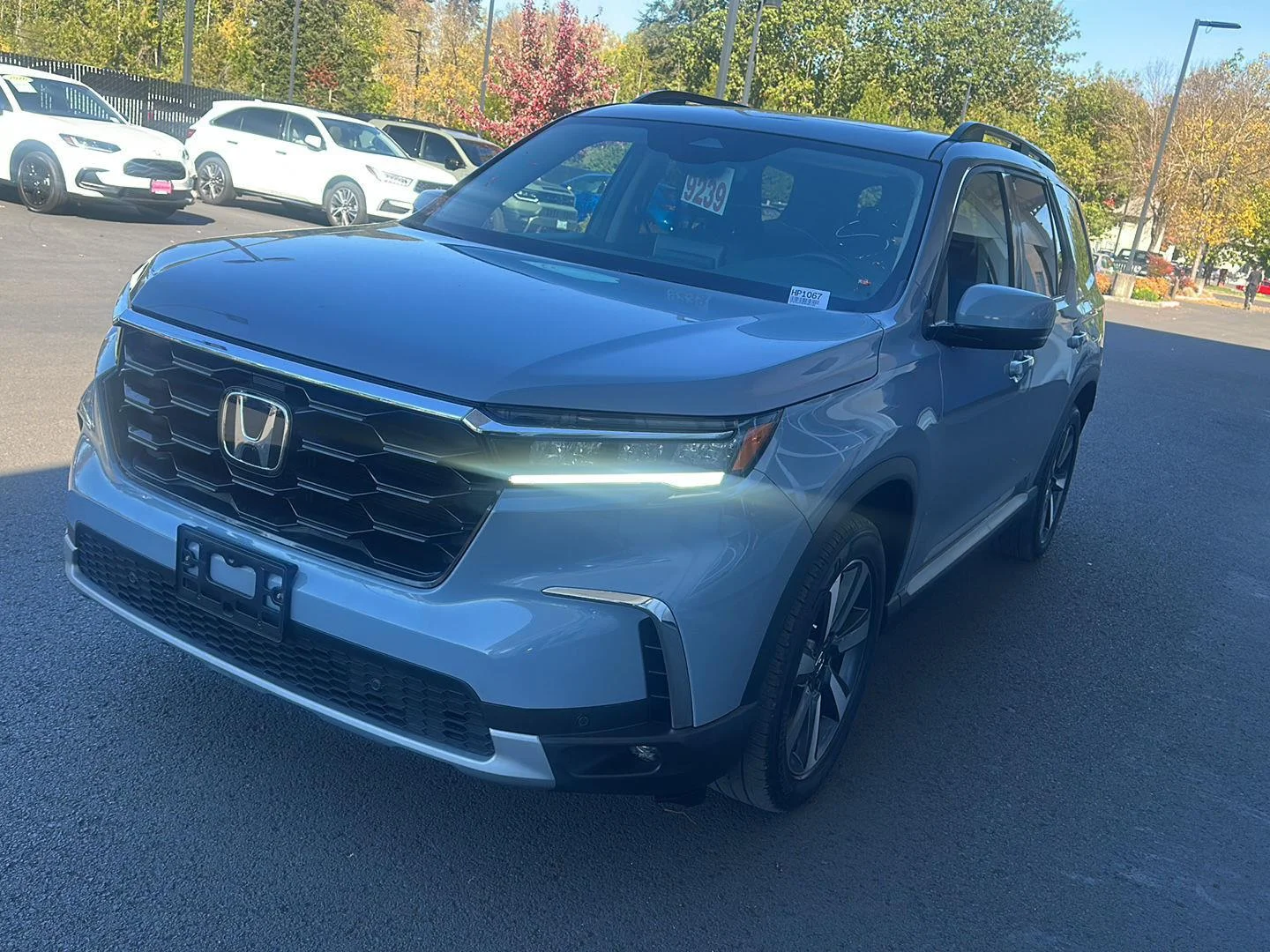 Used 2025 Sonic Gray Pearl Honda Touring image 1
